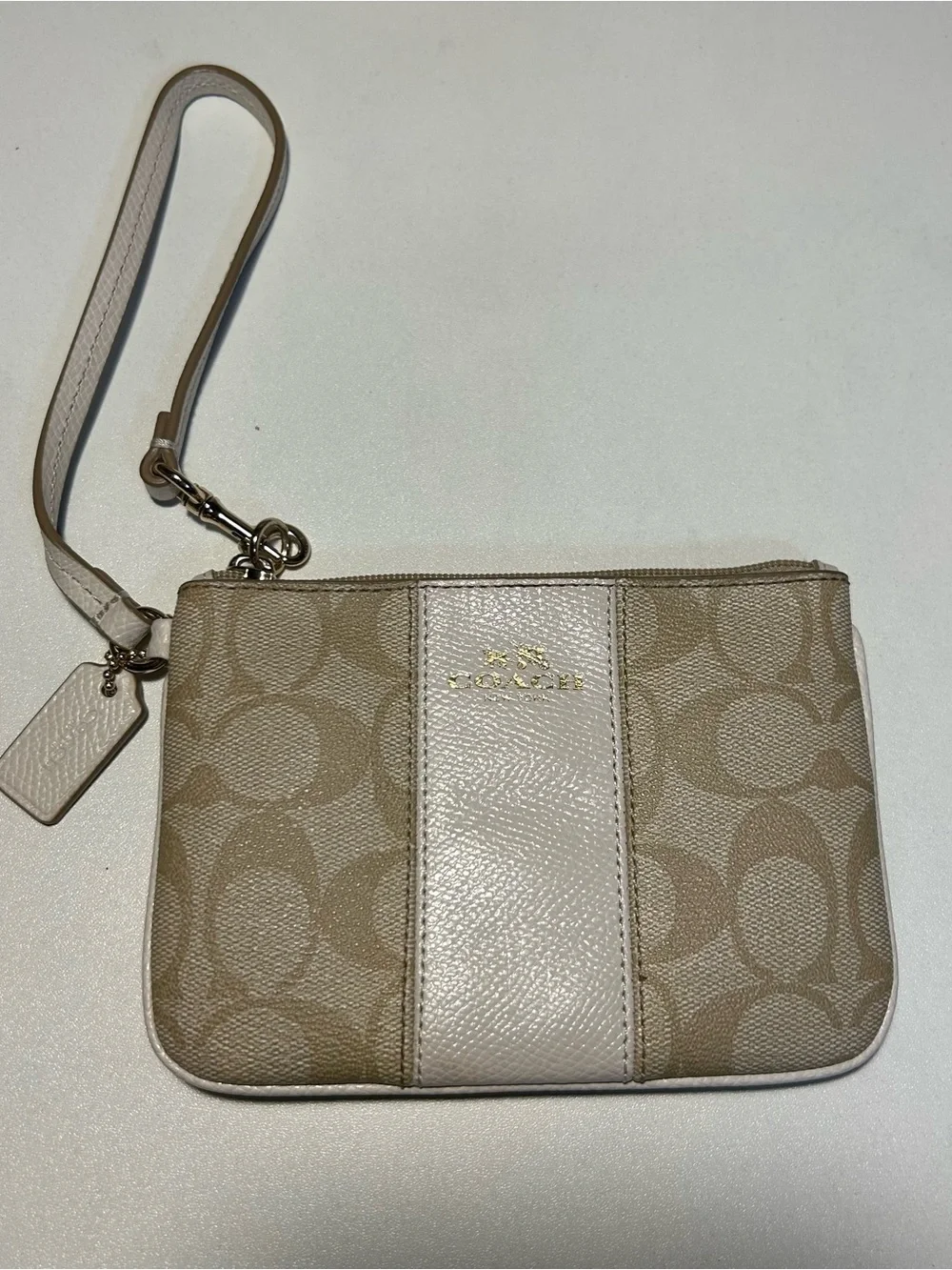 Coach Signature Canvas Zip Wristlet in Neutral Khaki Cream includes hang tag